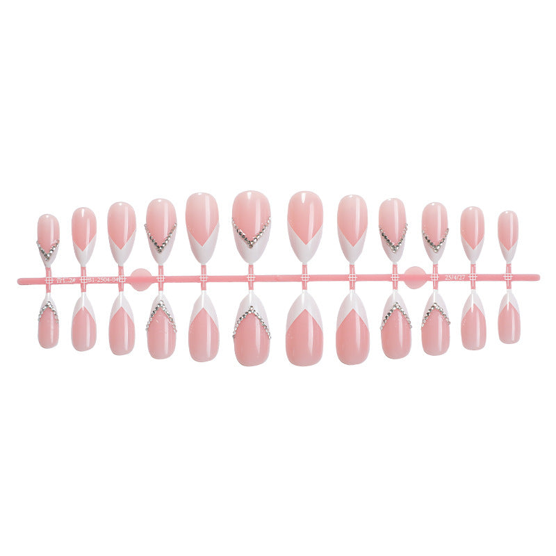 Elegant Pointed Press-On Nails with Rhinestone Accents Bowlift