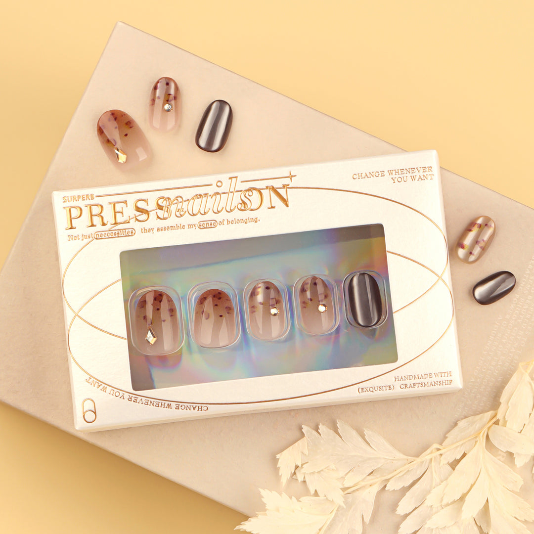 Artistic nail art with glitter accents and elegant design Bowlift
