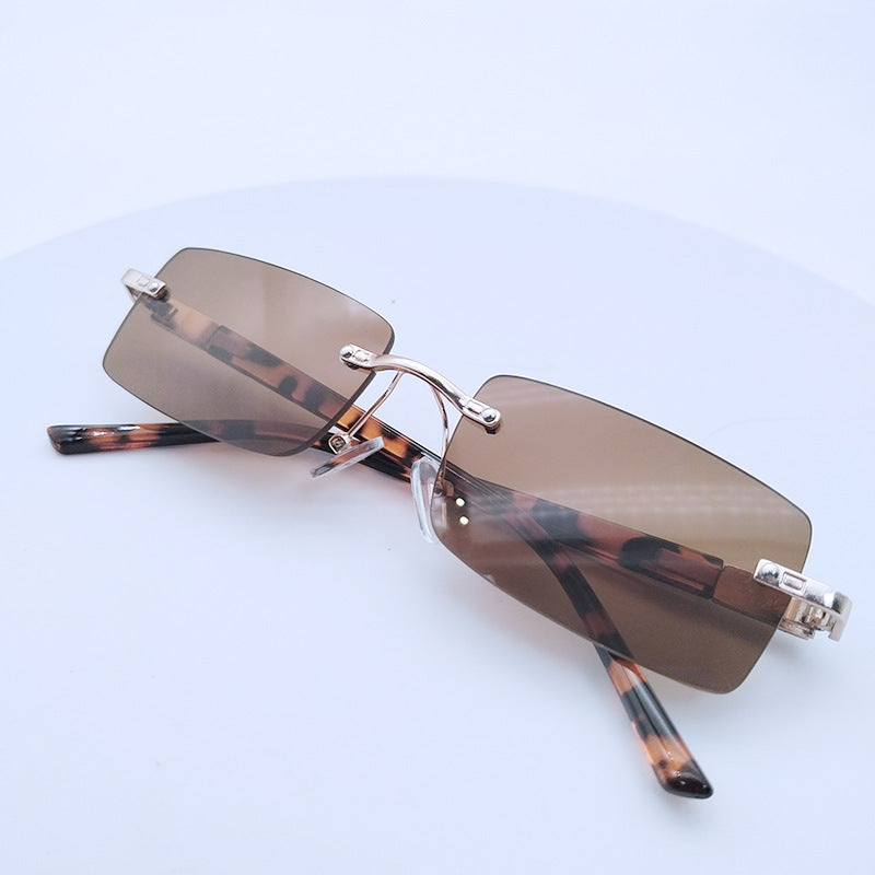 Women's fashionable rectangular sunglasses with unique design feature Bowlift