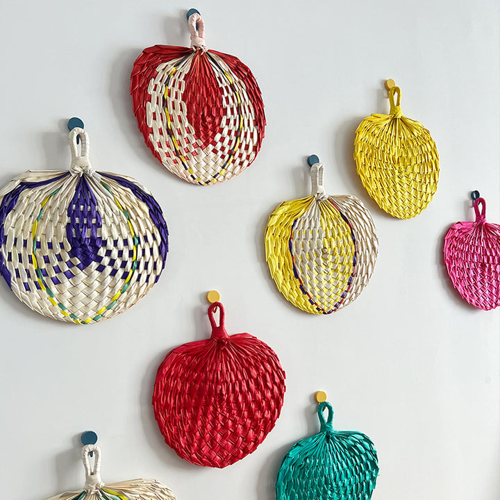 Women hand-woven fan made of natural material Bowlift
