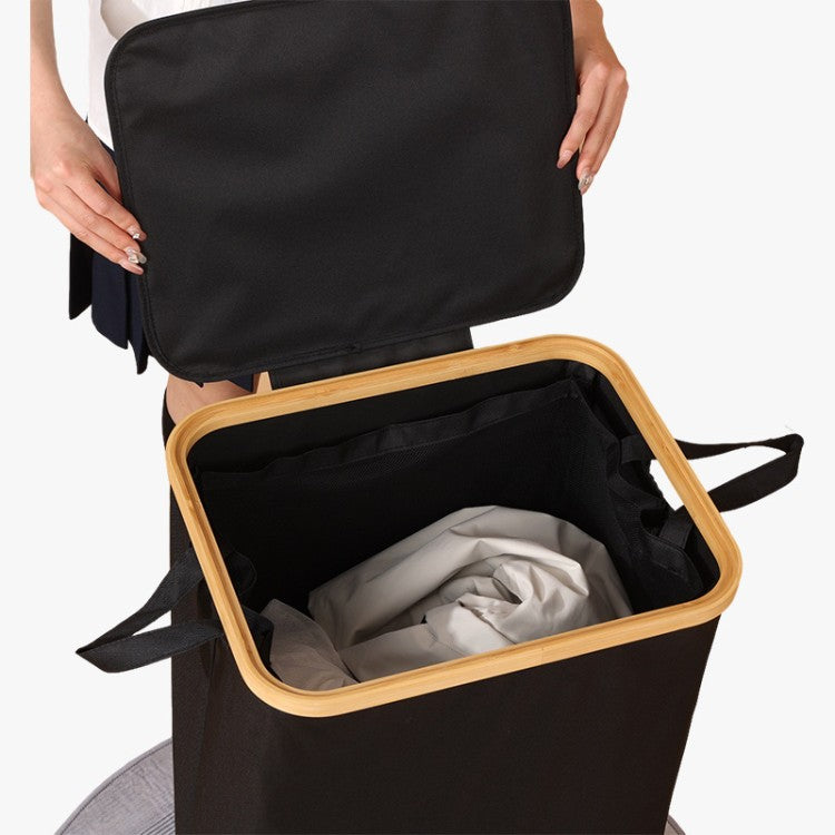 Elegant laundry container with practical lid and carrying system Bowlift