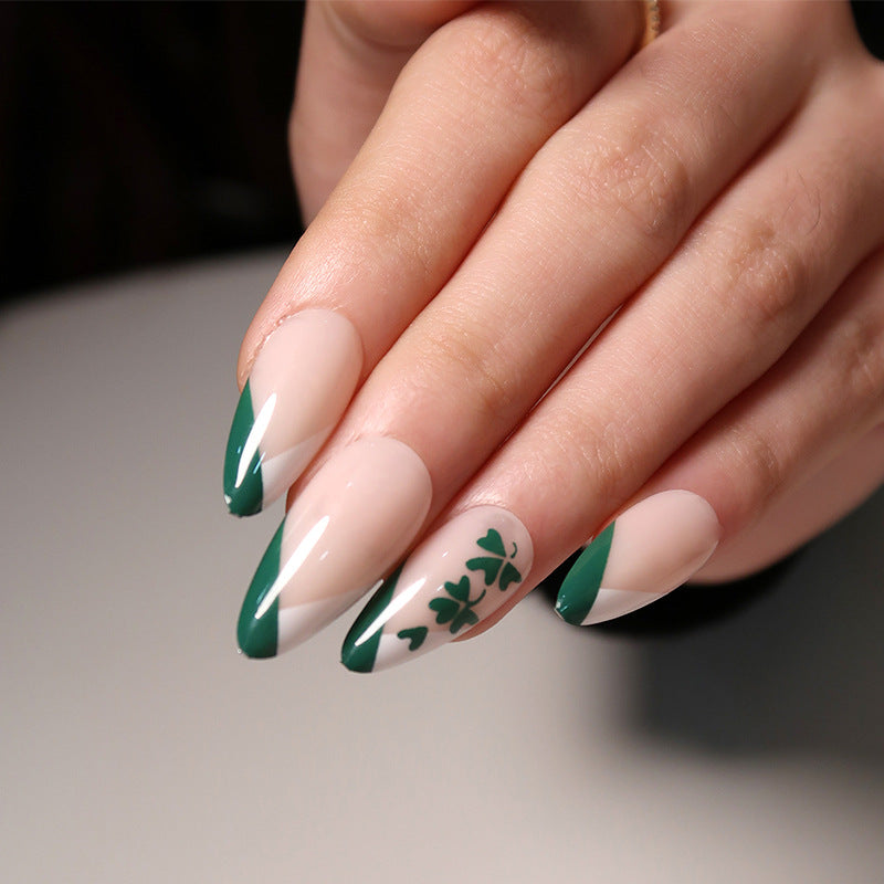 Artistic stiletto nails with cloverleaf design Bowlift