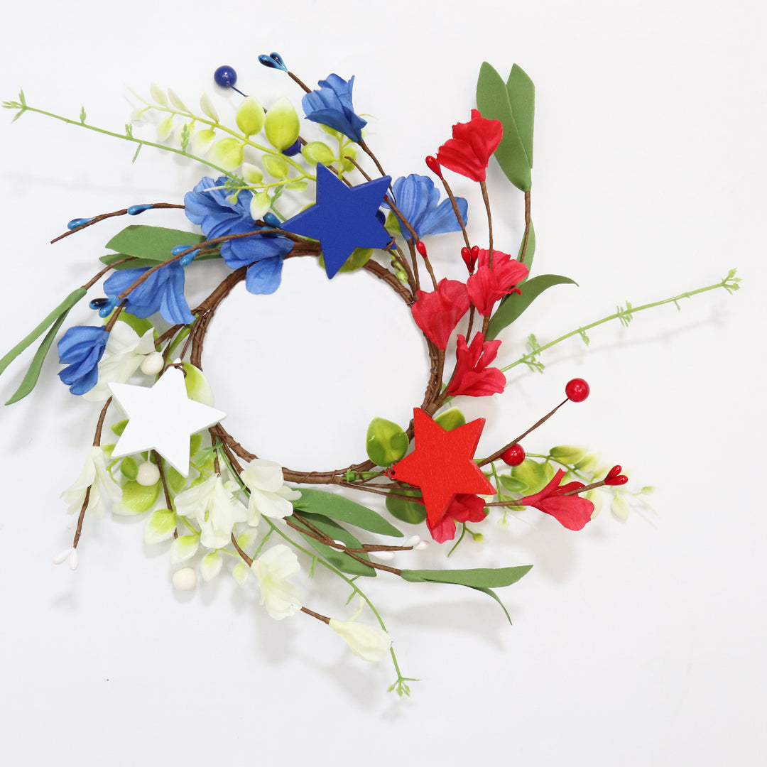 Unisex hand-crafted door wreath with wooden stars, artificial flowers, and flexible vine branch Bowlift