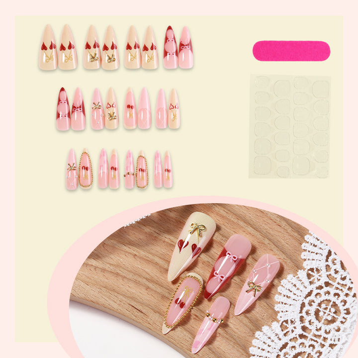 Creative nail art set with playful heart and bow accents Bowlift