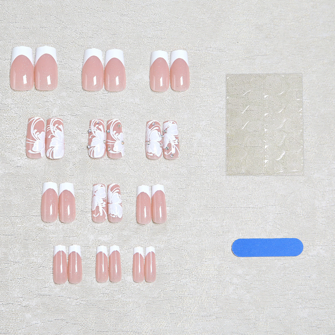 Artificial nails with floral embellishments and glitter details Bowlift