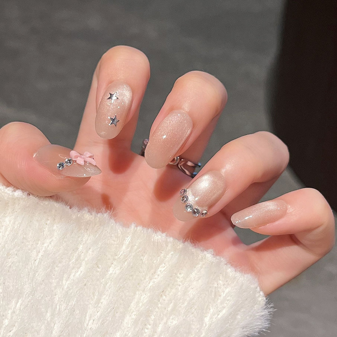 Elegant Nail Art Extensions with Pearl Accents Bowlift