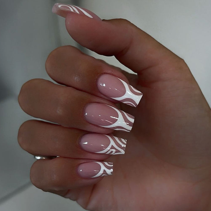 Artful nail extensions with translucent design and elegant lines Bowlift