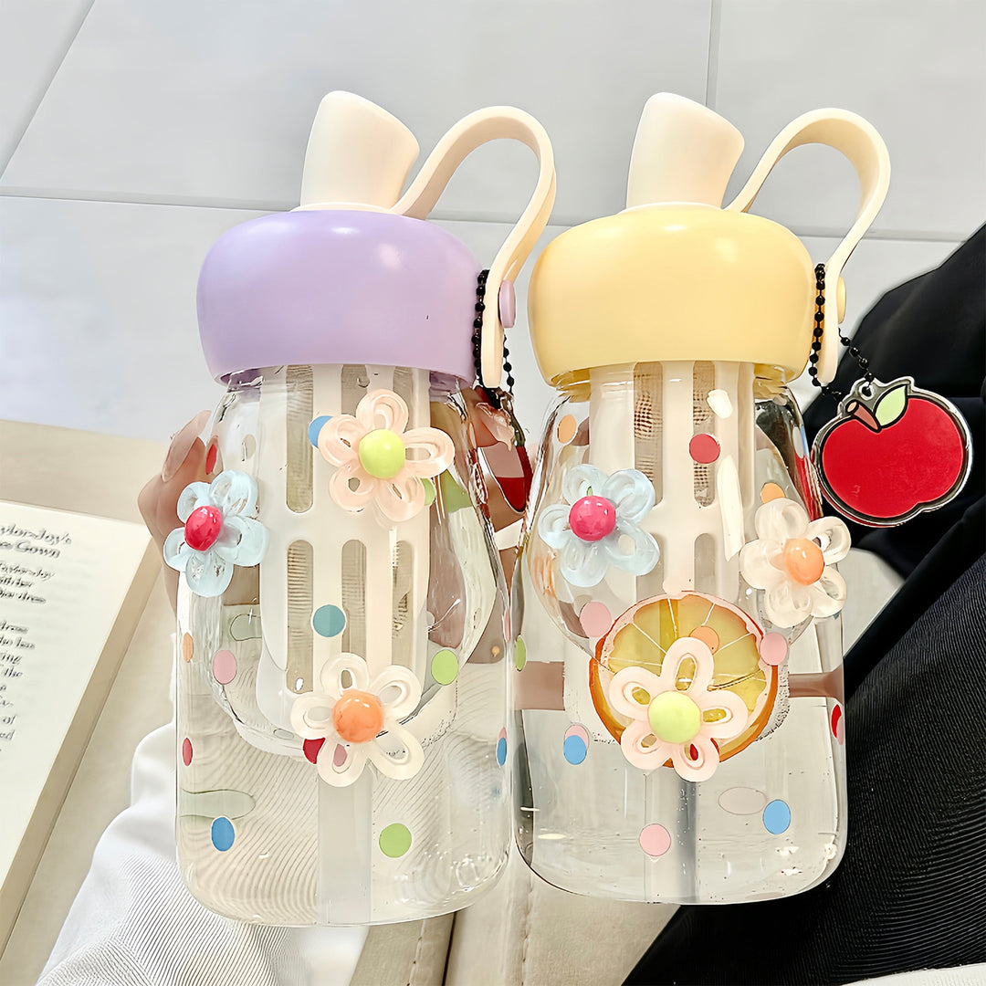 Women's water bottle with integrated fruit filter and practical carrying handle Bowlift