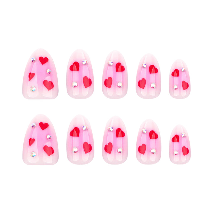 Artful nail art with heart motifs and glamorous details Bowlift