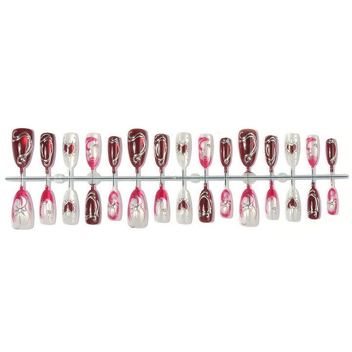 Artificial nail set with romantic decorations and glitter Bowlift