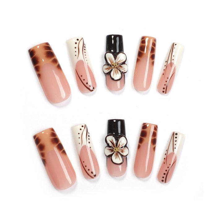 Creative nail art set with delicate floral and glitter accents Bowlift