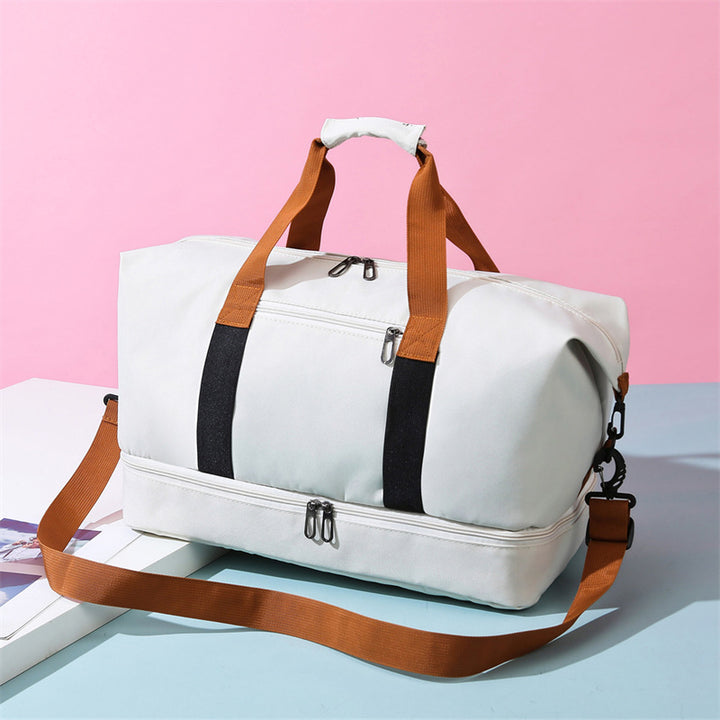 Sporty travel bag with adjustable shoulder strap and organizer compartments Bowlift
