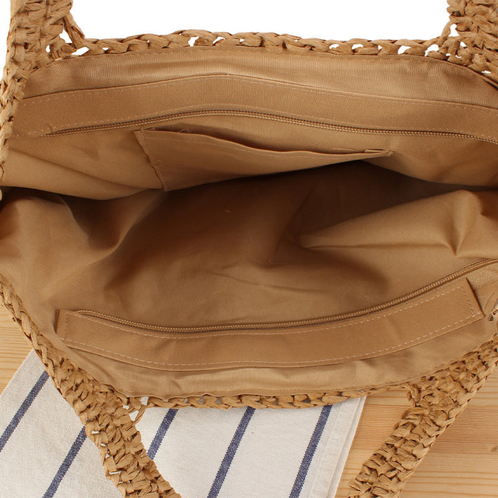 Handcrafted raffia shoulder bag with floral details Bowlift