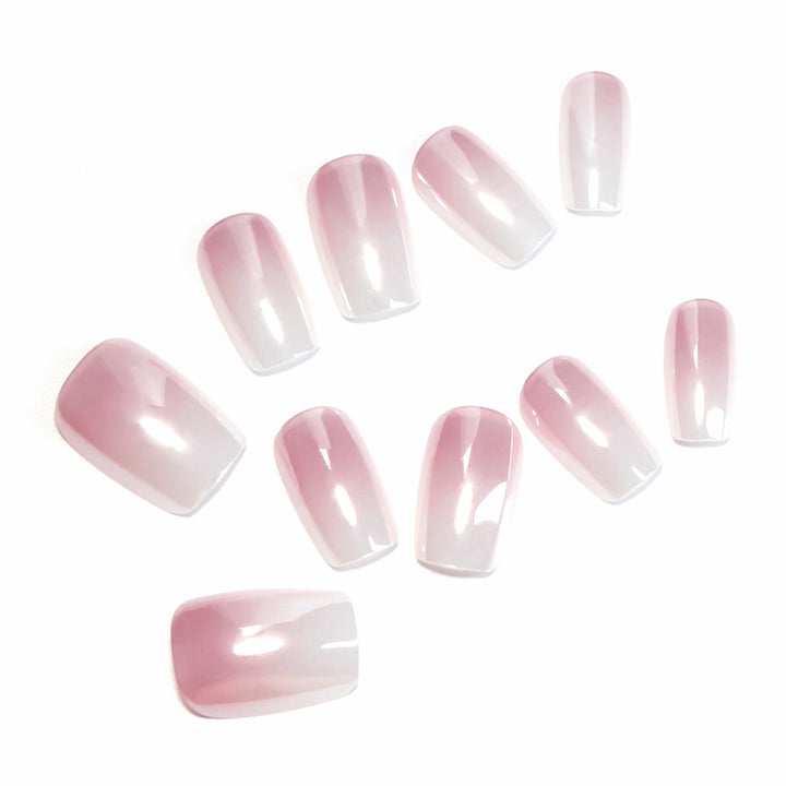 Artificial nail extensions in elegant ombre design Bowlift