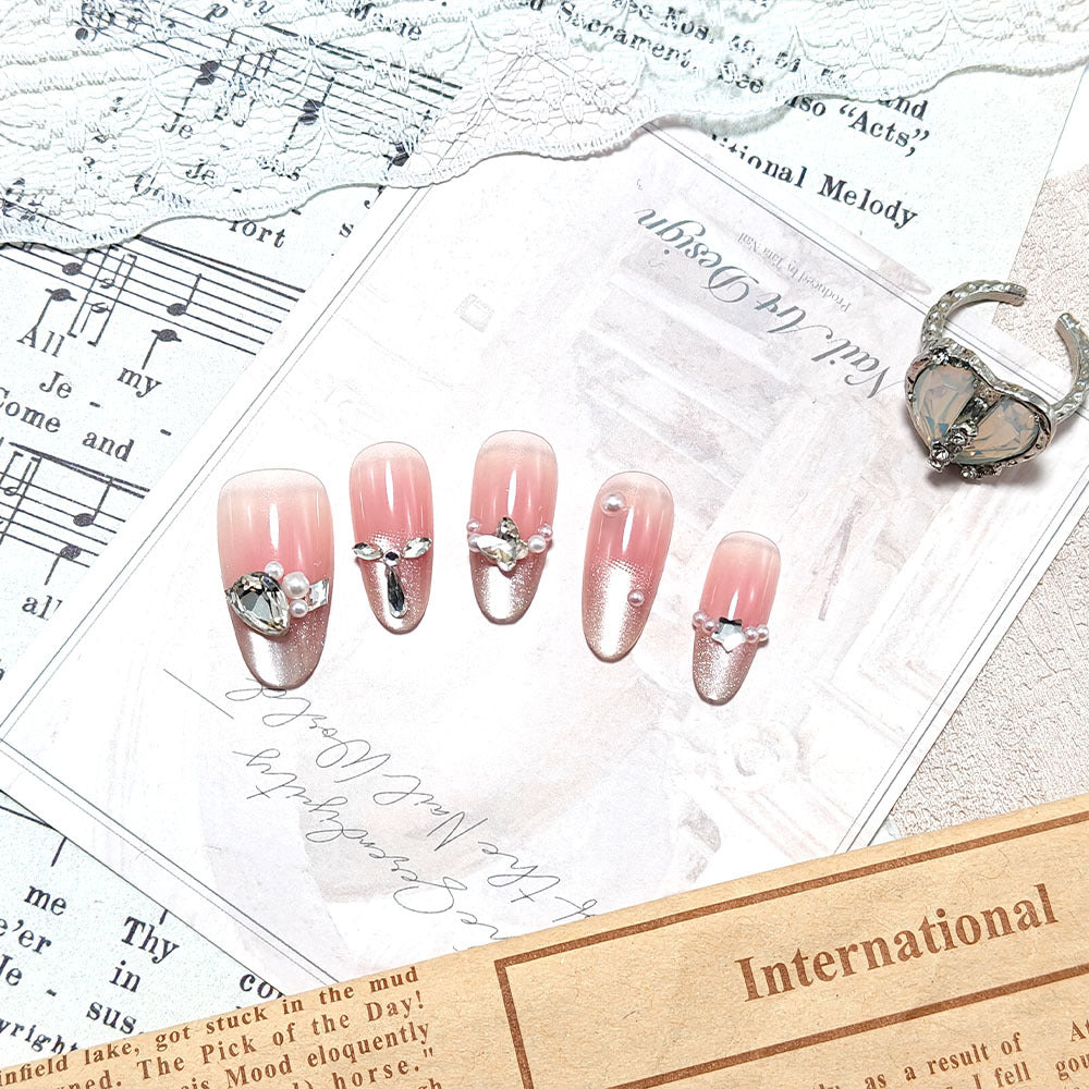 Artificial nails with luxurious jewelry accents Bowlift