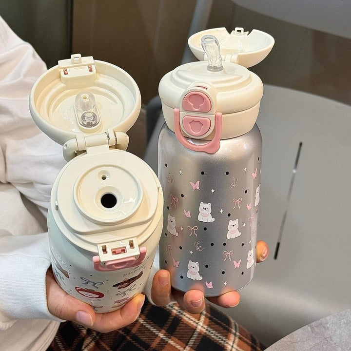 Women's stainless steel water bottle with innovative safety closure Bowlift
