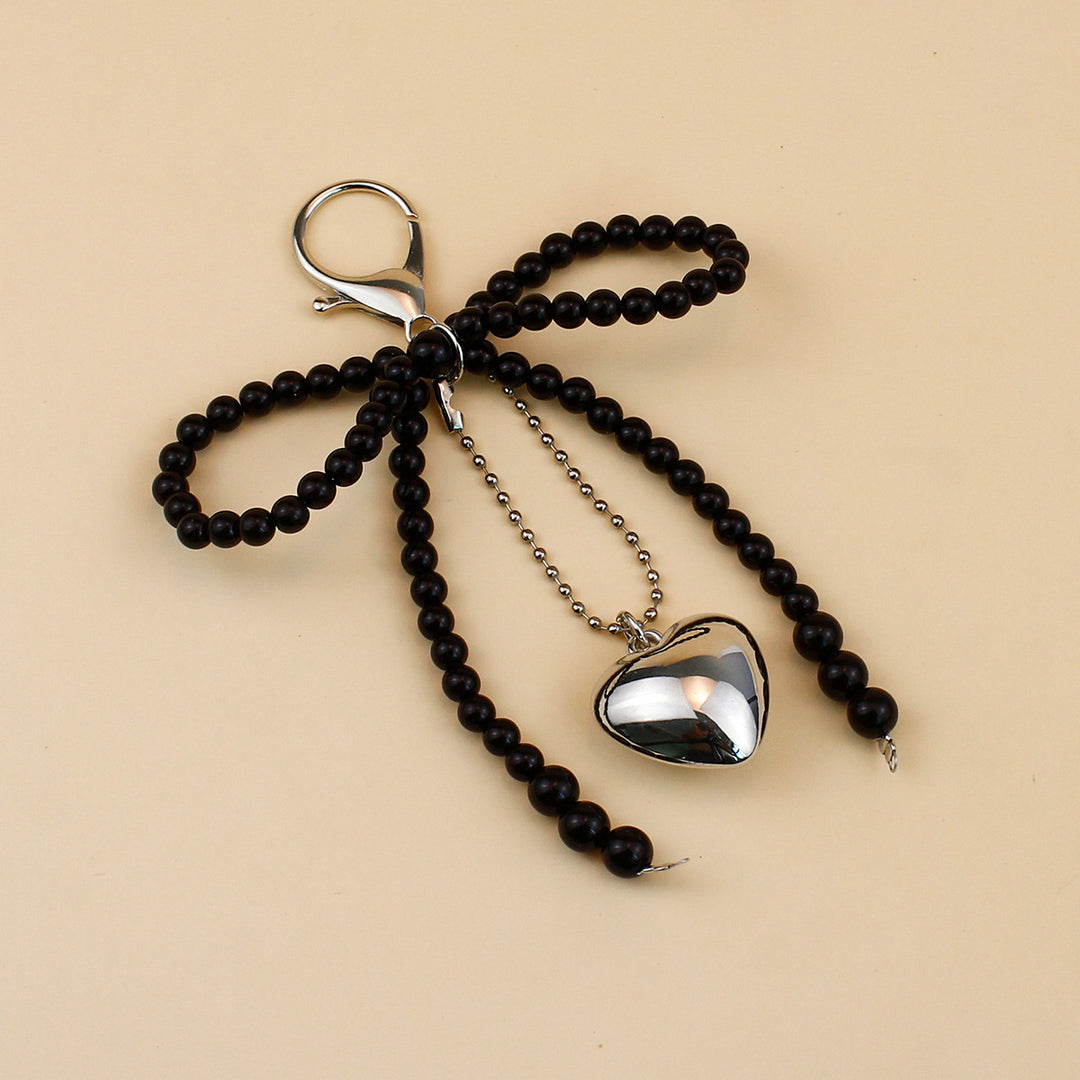 Elegant Pearl Bow Brooch Bowlift