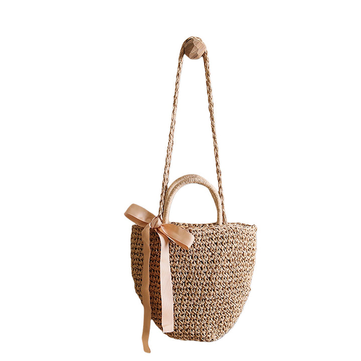 Basket bag with stylish carrying handles and decorative bow Bowlift
