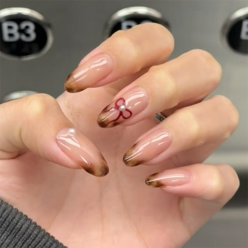 Artful Nail Art with Elegant Flower Design Bowlift