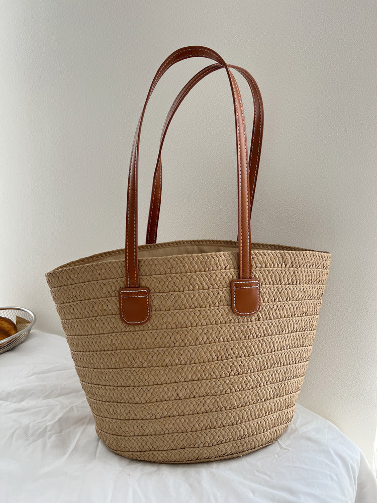 Handcrafted straw bag with elegant leather handles Bowlift