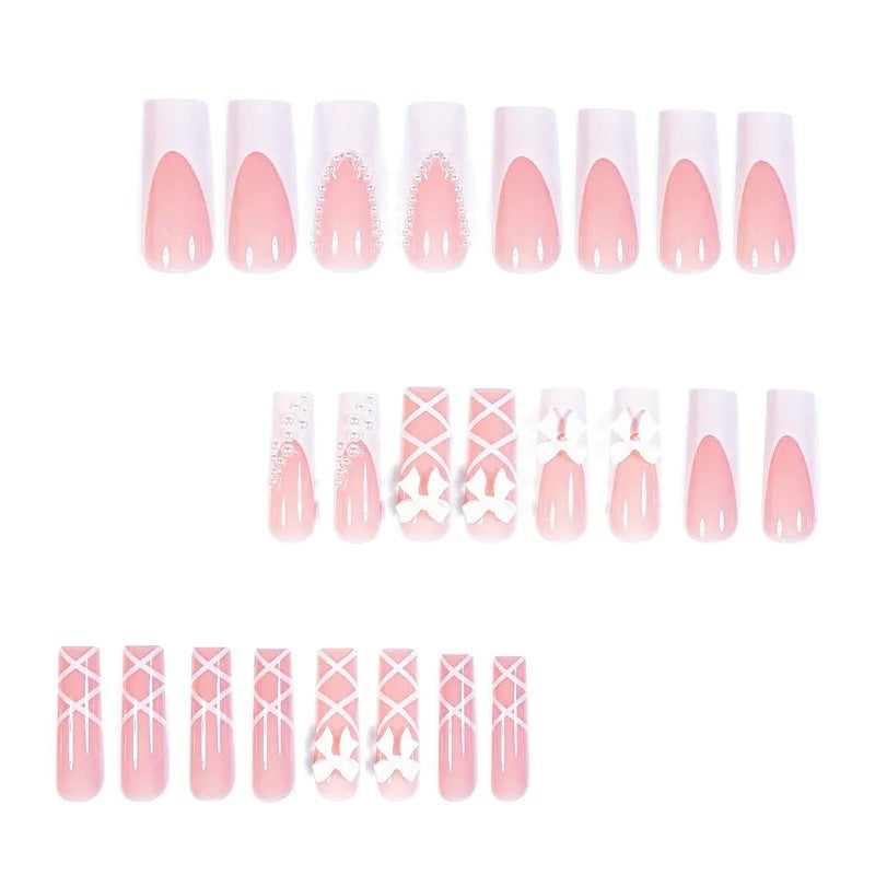 Artificial nail set with elegant 3D bows and pearl embellishments Bowlift