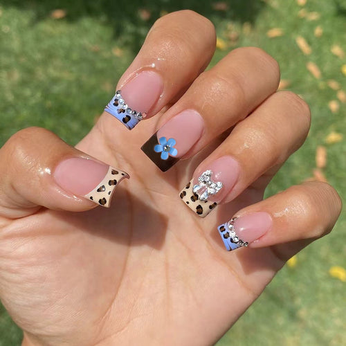 Artificial nails with stylish animal patterns and sparkling accents Bowlift