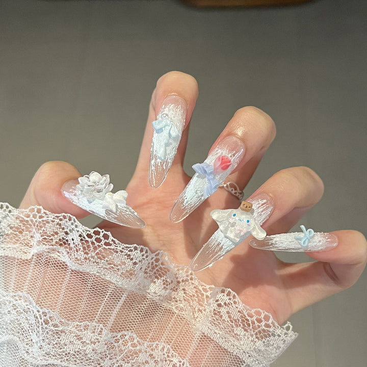 Artistic Stiletto Press-On Nail Art with Glimmering Accents Bowlift