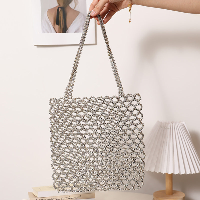 Sparkling Net Handbag Made of Braided Material Bowlift
