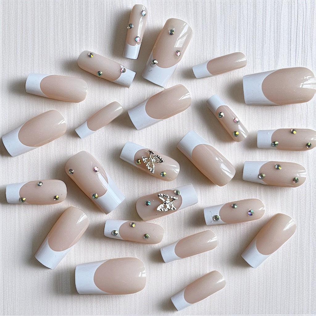 Elegant Stiletto Nail Extensions with Rhinestone Accents Bowlift