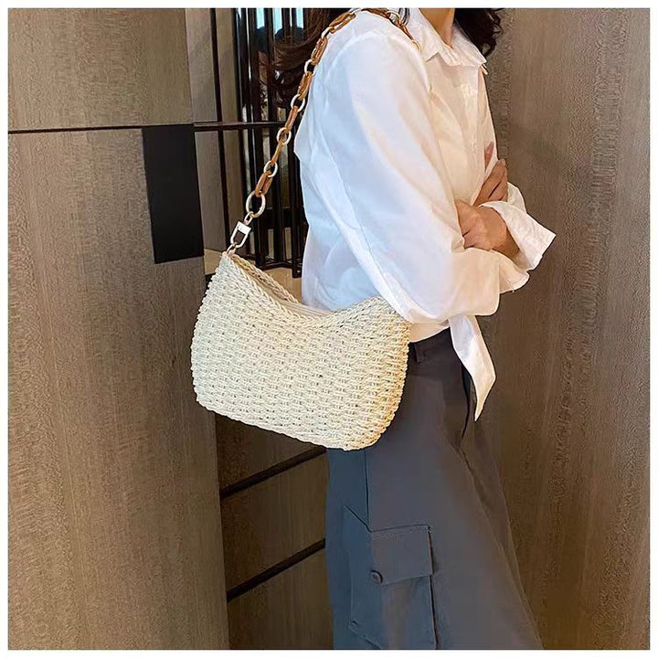 Handbag with chain carry handle Bowlift