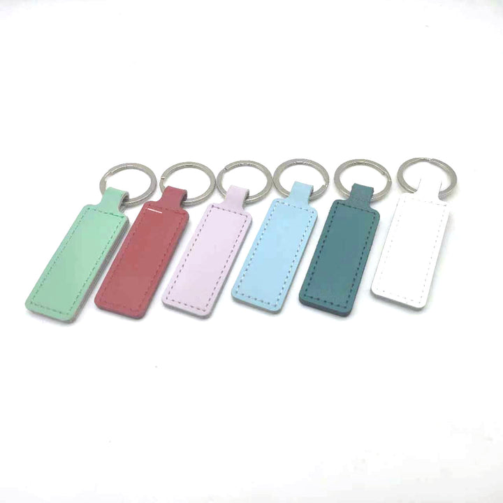 Unisex keychain with customizable faux leather Bowlift