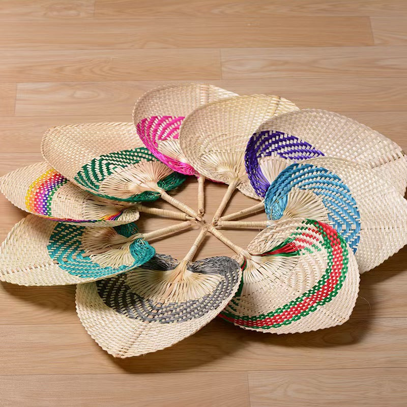 Women handmade fan made of natural material Bowlift