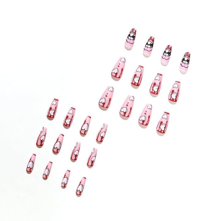 Artificial nail art with heart-shaped design and matte finish Bowlift