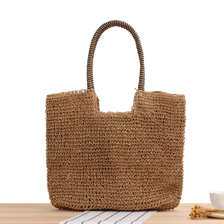 Handmade straw shoulder bag with structured design Bowlift