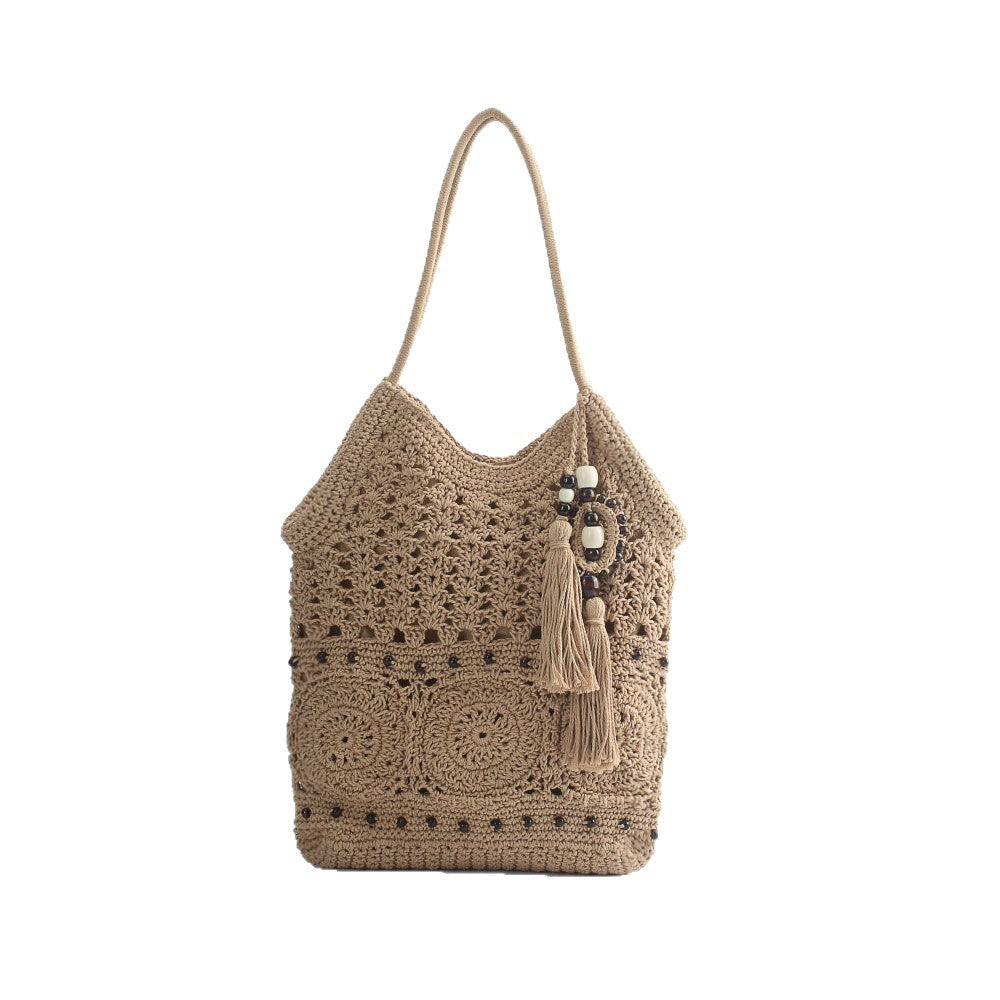 Crochet handbag with fringed accents Bowlift