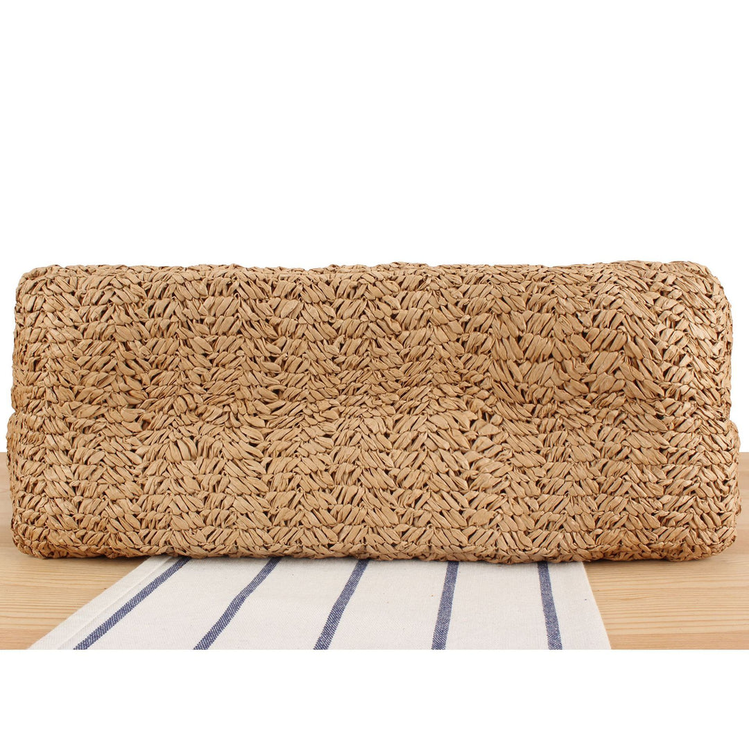 Beach bag made of natural woven material with sturdy carry handles Bowlift