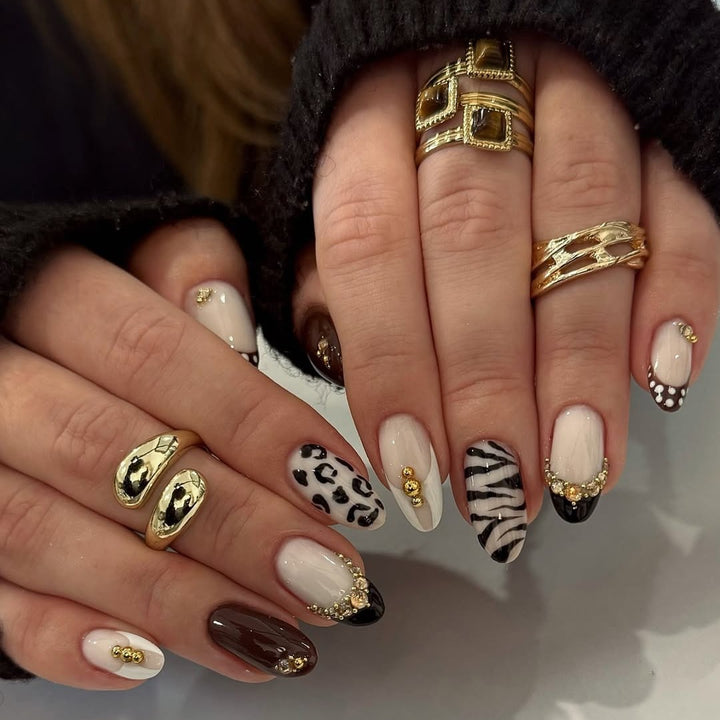 Acrylic nail set with luxurious animal motif designs and glamorous accents Bowlift