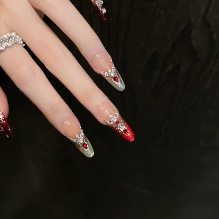 Artificial nail tips with sparkling crystal embellishments Bowlift