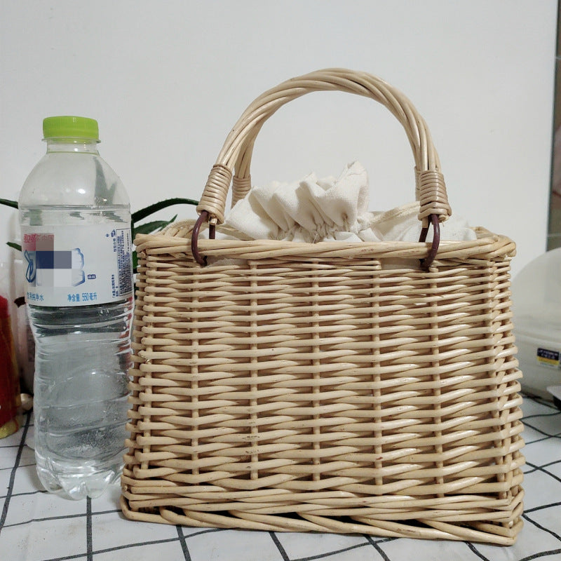 Women's handbag made of braided material with cotton drawstring closure Bowlift