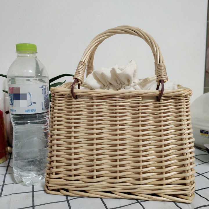 Women's handbag made of braided material with cotton drawstring closure Bowlift