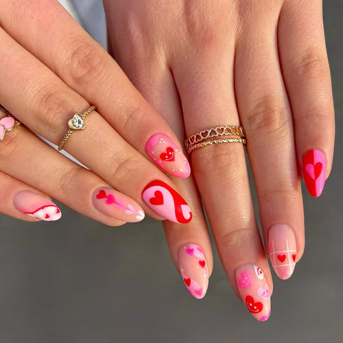 Acrylic nail set with romantic heart motifs and modern designs Bowlift