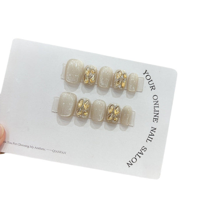 Artifical nail tips with glitter and rhinestones Bowlift