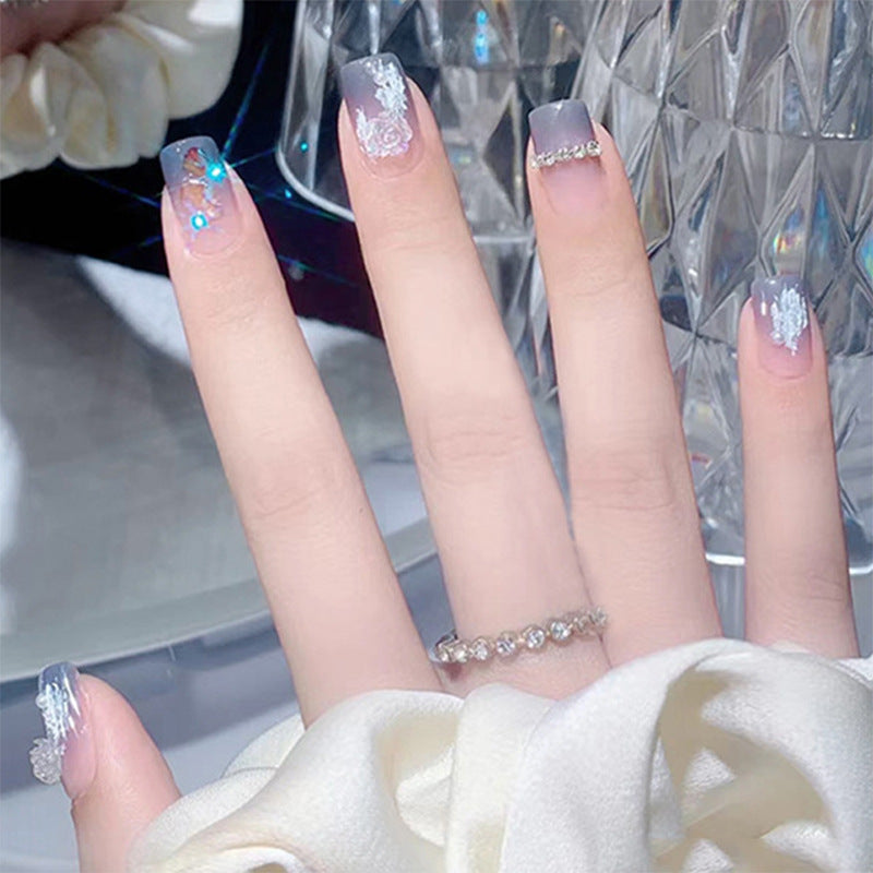 Glamorous artificial nails with heart and glitter details Bowlift