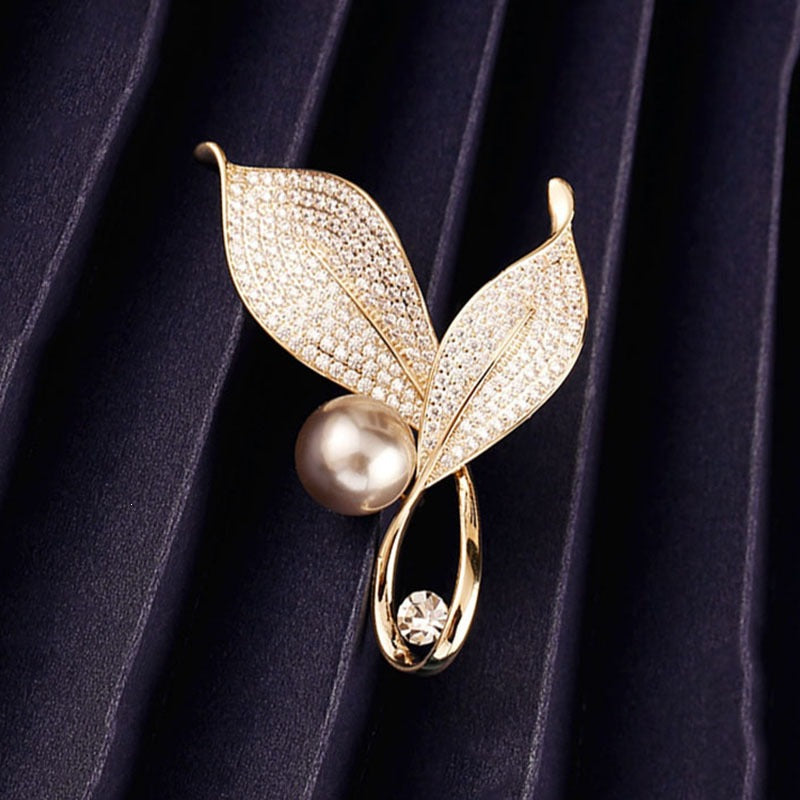 Elegant and Glamorous Brooch with Pearls and Crystals Bowlift