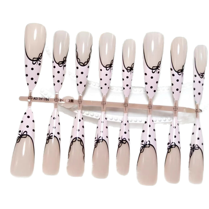 Elegant artificial nails with bow design and dots Bowlift