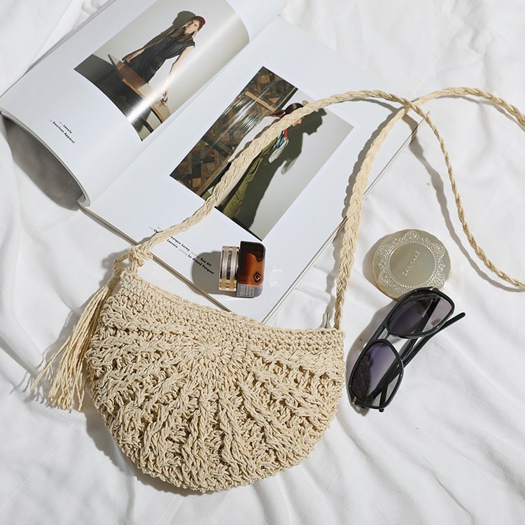 Hand-knotted sling bag with tassels Bowlift