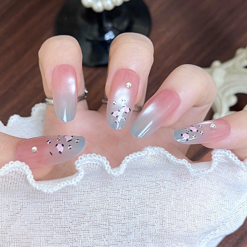 Artistic Stiletto Press-On Nail Set with Gemstone Accents Bowlift