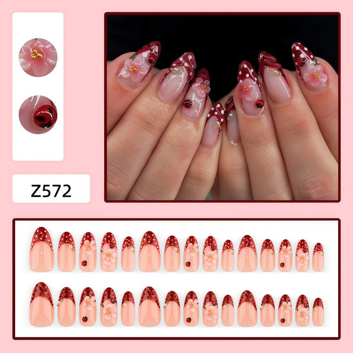 Artificial nails with floral design and 3D accents Bowlift