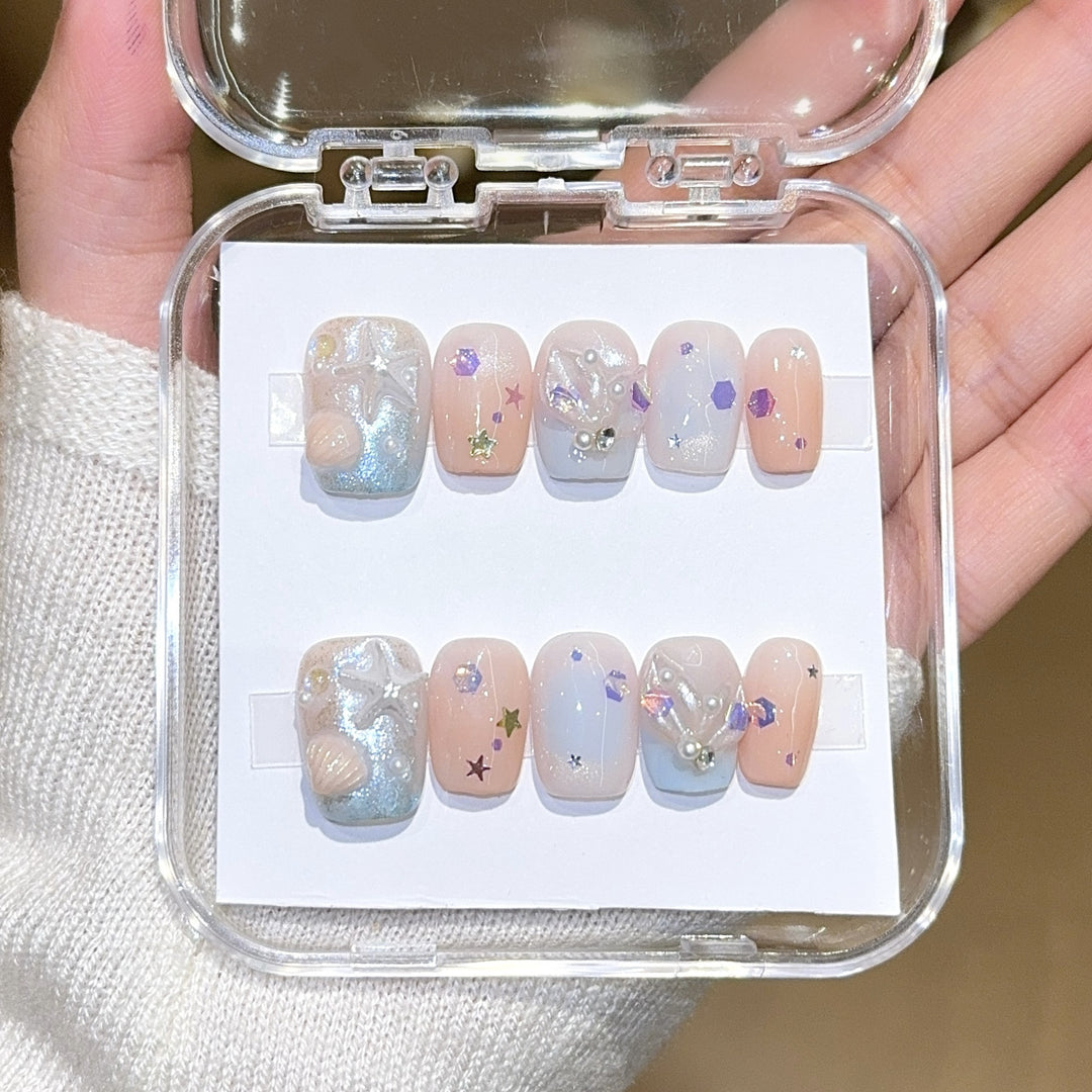 Artificial nails with sparkling galaxy design Bowlift