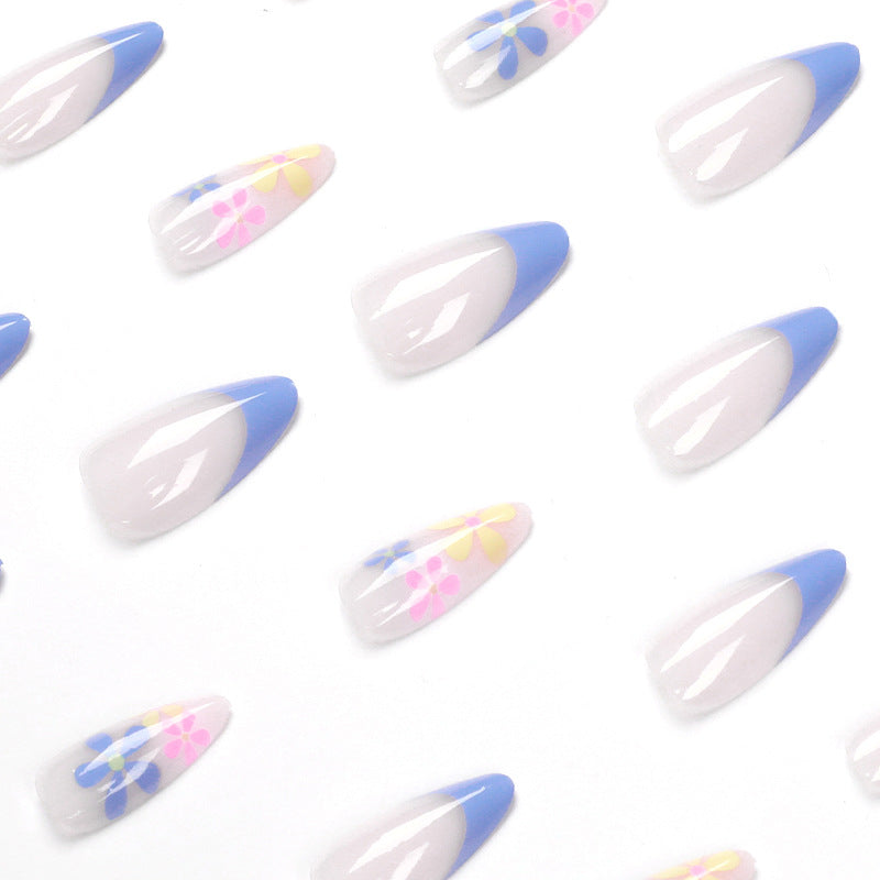 Artificial nail art with floral design and gradient Bowlift
